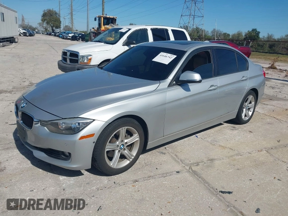 2013 BMW 3 Series 328i with VIN WBA3C1G55DNR49478, listed as a IAAI auction lot 41646742 with 142,034 mi miles and . Bid and sale history available at DreamBid. Image 2.