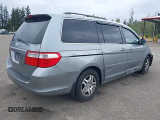 2007 Honda Odyssey EX-L with VIN 5FNRL38777B075985, listed as a IAAI auction lot 42083450 with 127,622 mi miles. Bid and sale history available at carsss.com. Image 4.