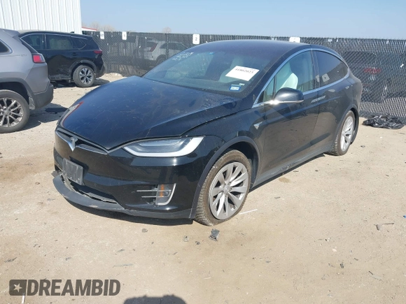 2019 Tesla Model X 75D with VIN 5YJXCBE22KF184504, listed as a IAAI auction lot 41802023 with 137,094 mi miles. Bid and sale history available at carsss.com. Image 17.