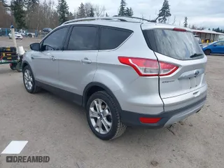 2015 Ford Escape Titanium with VIN 1FMCU9JX2FUB08134, listed as a IAAI auction lot 41839666 with 125,713 mi miles. Bid and sale history available at carsss.com. Image 3.