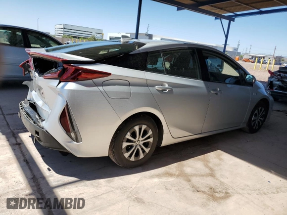 2021 Toyota Prius LE z VIN JTDKAMFP6M3183538, wystawiony jako Copart lot #54267425 z przebiegiem 29 374 mil mil oraz Szkoda całkowita • Salvage title. Historia ofert i sprzedaży dostępna na DreamBid. Obrazek 3.
