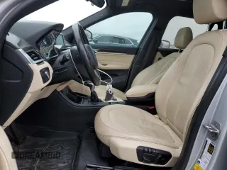 2017 BMW X1 sDrive28i with VIN WBXHU7C33H5H34013, listed as a Copart auction lot 38409444 with 87,558 mi miles and Salvage Title. Bid and sale history available at carsss.com. Image 7.