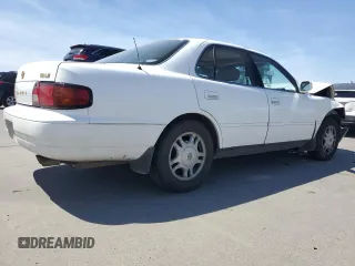 1996 Toyota Camry LE z VIN JT2BF12K2T0132606, wystawiony jako Copart lot #55530625 z przebiegiem 275 455 mil mil oraz Szkoda całkowita • Salvage title. Historia ofert i sprzedaży dostępna na DreamBid. Obrazek 3.