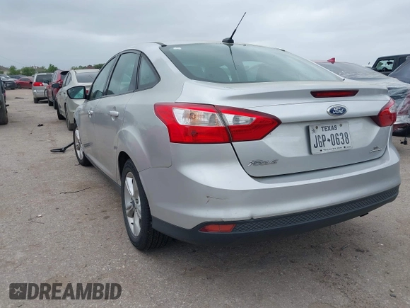 2014 Ford Focus SE with VIN 1FADP3F21EL354774, listed as a IAAI auction lot 41972701 with 115,046 mi miles. Bid and sale history available at carsss.com. Image 3.