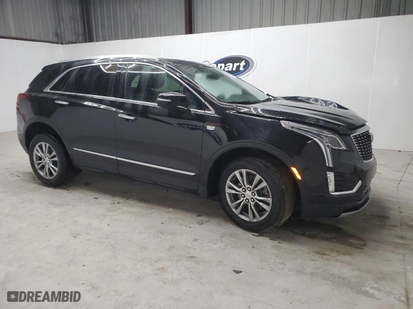 2023 Cadillac XT5 AWD Premium Luxury with VIN 1GYKNDRS1PZ133937, listed as a Copart auction lot 87600015 with 47,862 mi miles and Non Repairable. Bid and sale history available at carsss.com. Image 4.