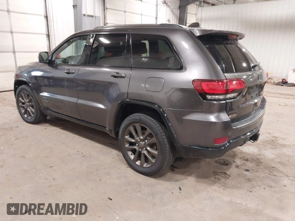 2016 Jeep Grand Cherokee Limited 75th Anniversary with VIN 1C4RJFBG2GC349154, listed as a IAAI auction lot 41392239 with 135,627 mi miles and . Bid and sale history available at DreamBid. Image 3.