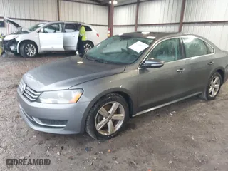 2012 Volkswagen Passat SE w/Sunroof with VIN 1VWBH7A38CC053564, listed as a IAAI auction lot 41488237 with 188,636 mi miles. Bid and sale history available at carsss.com. Image 2.