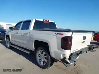 2015 Chevrolet Silverado 1500 High Country with VIN 3GCUKTEC9FG167929, listed as a IAAI auction lot 41668399 with 220,194 mi miles. Bid and sale history available at carsss.com. Image 3.