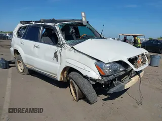 2004 Lexus GX 470 z VIN JTJBT20XX40040968, wystawiony jako IAAI lot #42131631 z przebiegiem 227 170 mil mil oraz . Historia ofert i sprzedaży dostępna na DreamBid. Obrazek 1.