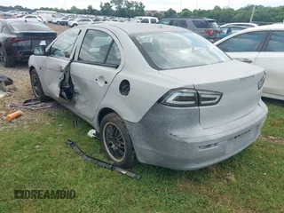2013 Mitsubishi Lancer ES with VIN JA32U2FUXDU006887, listed as a IAAI auction lot 42619092 with 154,715 mi miles and . Bid and sale history available at DreamBid. Image 3.