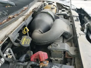 2009 Ford Econoline Cargo Commercial with VIN 1FTNE24W19DA72591, listed as a IAAI auction lot 42613439 with 239,038 mi miles and . Bid and sale history available at DreamBid. Image 13.