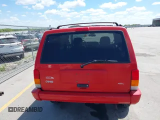 1997 Jeep Cherokee Country with VIN 1J4FJ78SXVL568925, listed as a IAAI auction lot 42254459 with Not provided miles and . Bid and sale history available at DreamBid. Image 12.