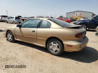 2000 Pontiac Sunfire SE z VIN 1G2JB1249Y7165024, wystawiony jako Copart lot #71418264 z przebiegiem Nie podano mil oraz Szkody całkowita. Historia ofert i sprzedaży dostępna na DreamBid. Obrazek 2.