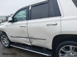 2015 Cadillac Escalade Premium with VIN 1GYS4NKJ9FR547587, listed as a IAAI auction lot 41556378 with 155,038 mi miles. Bid and sale history available at carsss.com. Image 14.