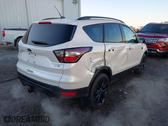 2017 Ford Escape Titanium with VIN 1FMCU9J93HUE96611, listed as a IAAI auction lot 41546906 with 90,586 mi miles. Bid and sale history available at carsss.com. Image 4.