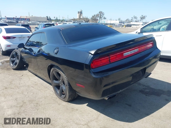 2014 Dodge Challenger R/T with VIN 2C3CDYBT8EH280622, listed as a IAAI auction lot 41973994 with 86,983 mi miles and . Bid and sale history available at DreamBid. Image 3.