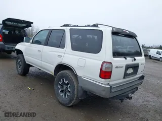 1999 Toyota 4Runner SR5 with VIN JT3HN86R1X0225292, listed as a IAAI auction lot 41848716 with 304,978 mi miles. Bid and sale history available at carsss.com. Image 3.