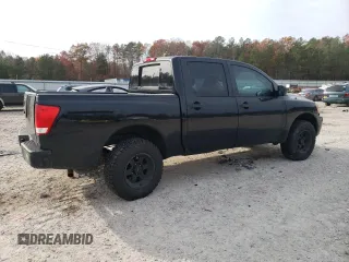 2010 Nissan Titan XE with VIN 1N6AA0EJ1AN323185, listed as a Copart auction lot 82813644 with 154,493 mi miles and Clean Title. Bid and sale history available at carsss.com. Image 3.