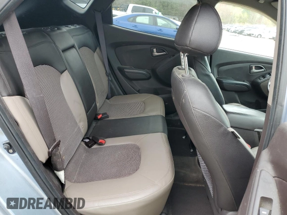 2011 Hyundai Tucson Limited with VIN KM8JUCAC8BU196358, listed as a Copart auction lot 51111975 with 200,439 mi miles and Salvage Title. Bid and sale history available at DreamBid. Image 11.