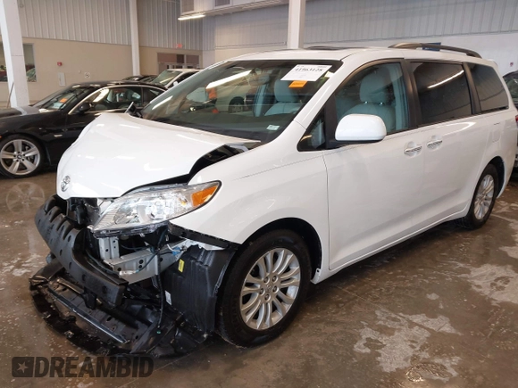 2014 Toyota Sienna XLE with VIN 5TDYK3DC5ES508021, listed as a IAAI auction lot 41963128 with 162,578 mi miles. Bid and sale history available at carsss.com. Image 19.