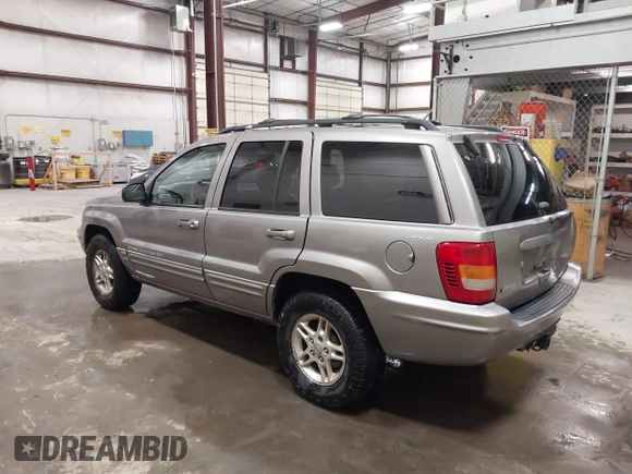 1999 Jeep Grand Cherokee Limited with VIN 1J4GW68N7XC752314, listed as a IAAI auction lot 41776905 with 228,023 mi miles. Bid and sale history available at carsss.com. Image 3.