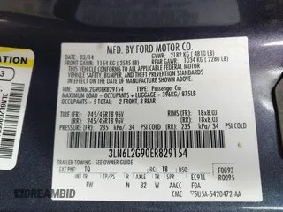 2014 Lincoln MKZ with VIN 3LN6L2G90ER829154, listed as a IAAI auction lot 41653378 with 199,363 mi miles. Bid and sale history available at carsss.com. Image 9.