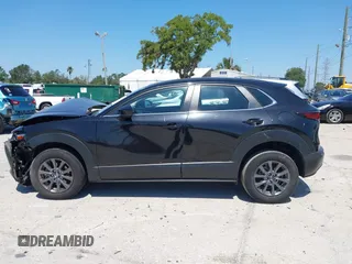 2021 Mazda CX-30 S with VIN 3MVDMAAL7MM268341, listed as a IAAI auction lot 42051154 with 19,539 mi miles and . Bid and sale history available at carsss.com. Image 14.