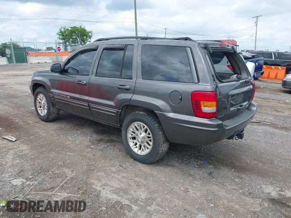 2002 Jeep Grand Cherokee Limited with VIN 1J8GW58N22C173250, listed as a IAAI auction lot 42480524 with 162,341 mi miles and . Bid and sale history available at DreamBid. Image 3.