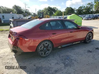 2024 BMW i5 eDrive40 with VIN WBY33FK01RCR76500, listed as a Copart auction lot 65026585 with 3,601 mi miles and Salvage title. Bid and sale history available at DreamBid. Image 3.