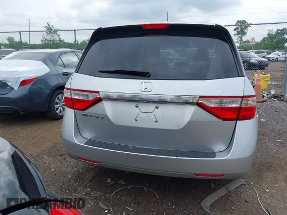 2011 Honda Odyssey LX with VIN 5FNRL5H25BB040287, listed as a IAAI auction lot 42456679 with 129,176 mi miles and . Bid and sale history available at DreamBid. Image 16.