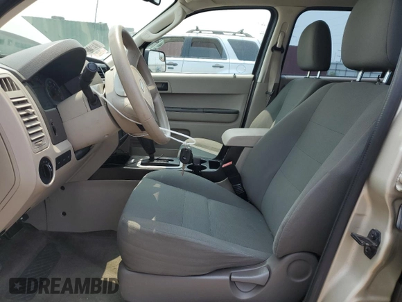 2011 Ford Escape XLS with VIN 1FMCU0C75BKC58172, listed as a Copart auction lot 60492825 with 114,518 mi miles and Salvage title. Bid and sale history available at DreamBid. Image 7.