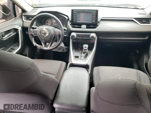 2019 Toyota RAV4 XLE with VIN JTMP1RFV9KD506960, listed as a Copart auction lot 50242025 with 102,157 mi miles and Salvage Title. Bid and sale history available at DreamBid. Image 8.