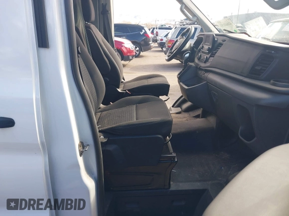 2020 Ford Transit Cargo with VIN 1FTBR2CG1LKB43034, listed as a IAAI auction lot 41668193 with 56,827 mi miles and . Bid and sale history available at DreamBid. Image 8.