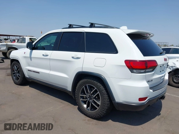 2019 Jeep Grand Cherokee Trailhawk with VIN 1C4RJFLT7KC751143, listed as a IAAI auction lot 42749406 with 54,024 mi miles and . Bid and sale history available at DreamBid. Image 3.