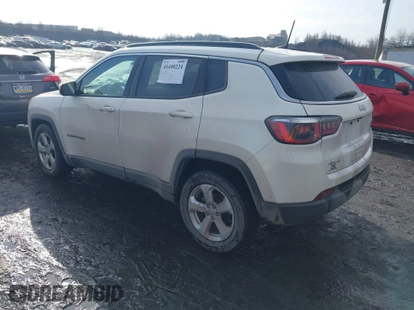 2019 Jeep Compass Latitude with VIN 3C4NJDBB7KT703593, listed as a IAAI auction lot 41490224 with 99,640 mi miles. Bid and sale history available at carsss.com. Image 3.