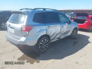 2017 Subaru Forester Touring with VIN JF2SJGTC9HH409665, listed as a IAAI auction lot 41749546 with 118,635 mi miles. Bid and sale history available at carsss.com. Image 4.