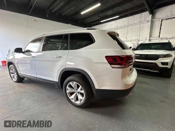 2019 Volkswagen Atlas SE z VIN 1V2WR2CA2KC522435, wystawiony jako Copart lot #53476545 z przebiegiem 154 951 mil mil oraz Czysty tytuł • Clean title. Historia ofert i sprzedaży dostępna na DreamBid. Obrazek 3.