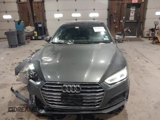 2018 Audi A5 Premium Plus with VIN WAUTNAF50JA011354, listed as a IAAI auction lot 41396659 with 74,936 mi miles and . Bid and sale history available at DreamBid. Image 12.