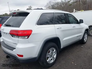 2014 Jeep Grand Cherokee Laredo with VIN 1C4RJEAG3EC180965, listed as a IAAI auction lot 41488781 with 108,633 mi miles. Bid and sale history available at carsss.com. Image 4.