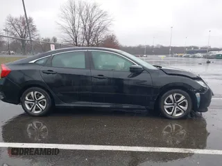 2018 Honda Civic LX with VIN 2HGFC2F54JH548274, listed as a IAAI auction lot 41864457 with 60,905 mi miles and . Bid and sale history available at DreamBid. Image 13.