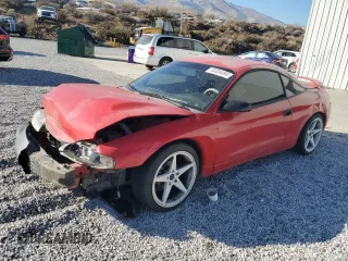 1999 Mitsubishi Eclipse RS with VIN 4A3AK34Y0XE143864, listed as a Copart auction lot 83334494 with 275,714 mi miles and Salvage Title. Bid and sale history available at carsss.com. Image 1.