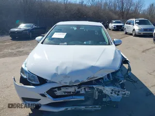 2017 Chevrolet Cruze LS with VIN 1G1BC5SM4H7165610, listed as a IAAI auction lot 41709729 with 24,853 mi miles and . Bid and sale history available at DreamBid. Image 13.