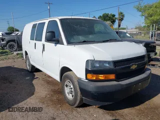 2018 Chevrolet Express Cargo Van with VIN 1GCWGAFP0J1182701, listed as a IAAI auction lot 42014825 with 206,702 mi miles. Bid and sale history available at carsss.com. Image 1.