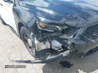2014 Ford Police Interceptor with VIN 1FAHP2MKXEG185863, listed as a IAAI auction lot 42297860 with 115,188 mi miles and . Bid and sale history available at DreamBid. Image 6.
