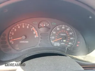 1994 Mitsubishi 3000GT z VIN JA3AM54J6RY009694, wystawiony jako Copart lot #77572864 z przebiegiem 175 629 mil mil oraz Tytuł czysty. Historia ofert i sprzedaży dostępna na DreamBid. Obrazek 9.