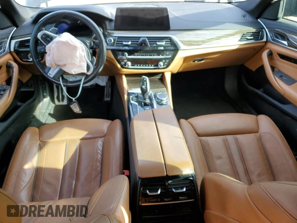 2018 BMW 5 Series 530i z VIN WBAJA5C5XJWA36332, wystawiony jako Copart lot #47810135 z przebiegiem 131 011 mil mil oraz Szkoda całkowita • Salvage title. Historia ofert i sprzedaży dostępna na DreamBid. Obrazek 8.