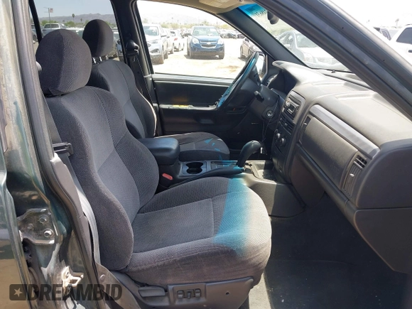 2001 Jeep Grand Cherokee Laredo with VIN 1J4GW48N51C612600, listed as a IAAI auction lot 42348631 with 165,918 mi miles and . Bid and sale history available at DreamBid. Image 5.
