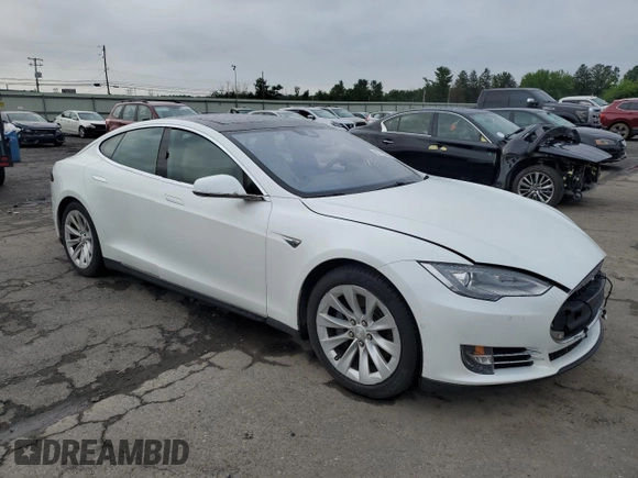 2016 Tesla Model S 90D with VIN 5YJSA1E26GF133699, listed as a Copart auction lot 62703535 with Not provided miles and Salvage title. Bid and sale history available at DreamBid. Image 4.
