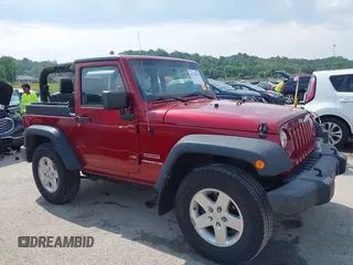 2013 Jeep Wrangler Sport z VIN 1C4GJWAG0DL543850, wystawiony jako IAAI lot #42374916 z przebiegiem 163 977 mil mil oraz . Historia ofert i sprzedaży dostępna na DreamBid. Obrazek 13.