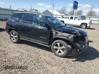 2016 Jeep Compass High Altitude Edition with VIN 1C4NJDEB0GD772702, listed as a Copart auction lot 52634105 with 74,494 mi miles and Salvage Title. Bid and sale history available at carsss.com. Image 4.
